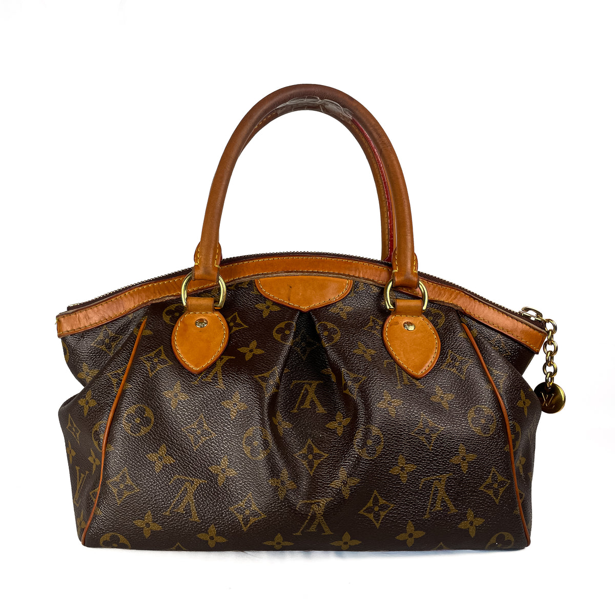 A Louis Vuitton monogram canvas handbag with brown leather handles and trim, shown against a plain white background.