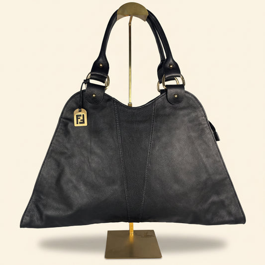 Gold-tone Fendi logo charm on Diavolo Trapezo bag