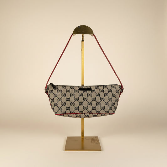 Front view of beige Gucci GG Canvas Boat shoulder bag