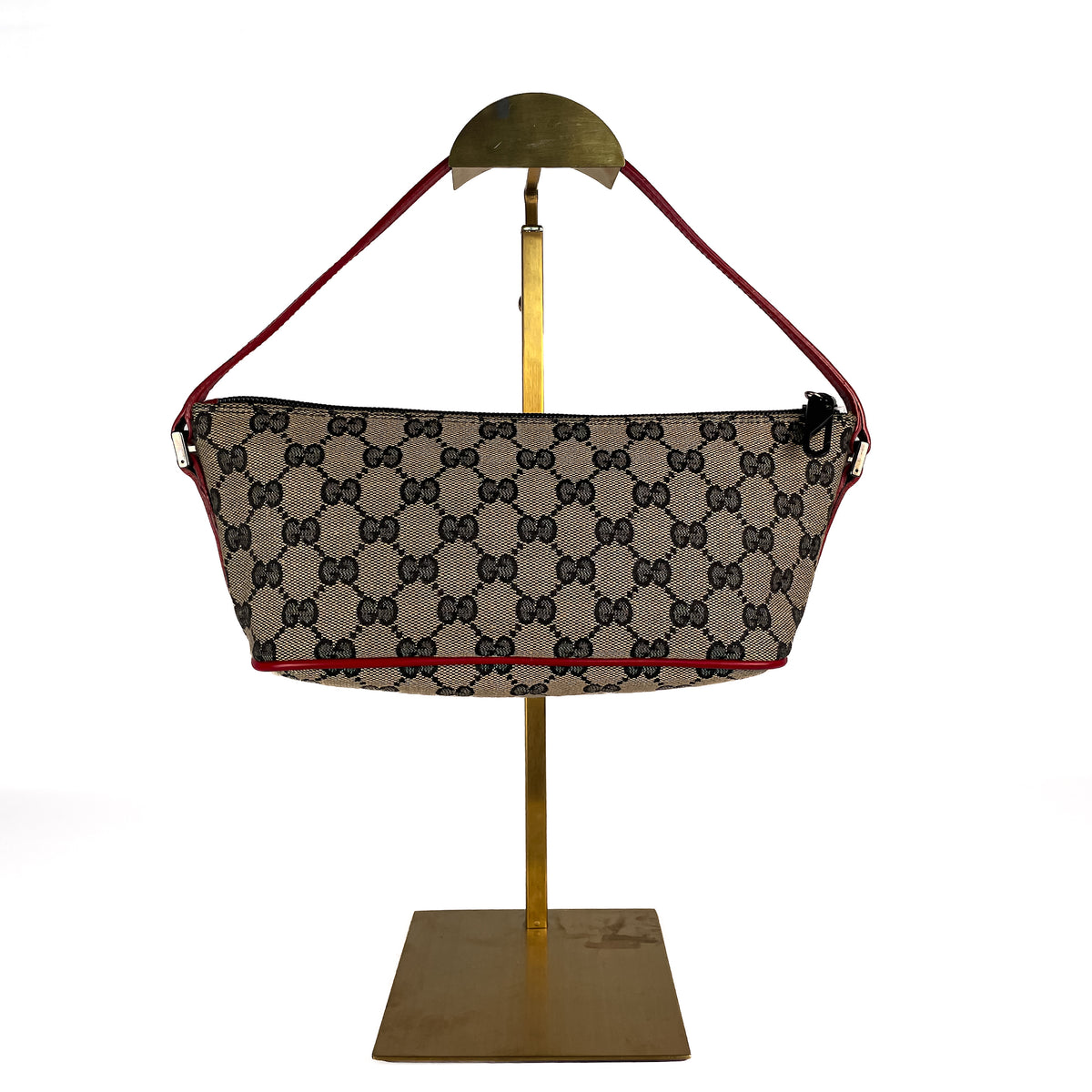 Rear view of beige Gucci GG Canvas Boat shoulder bag