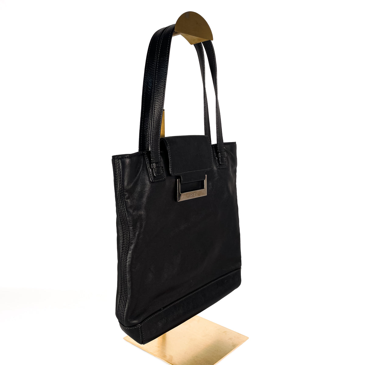 Side view of black Loewe 2003 leather tote