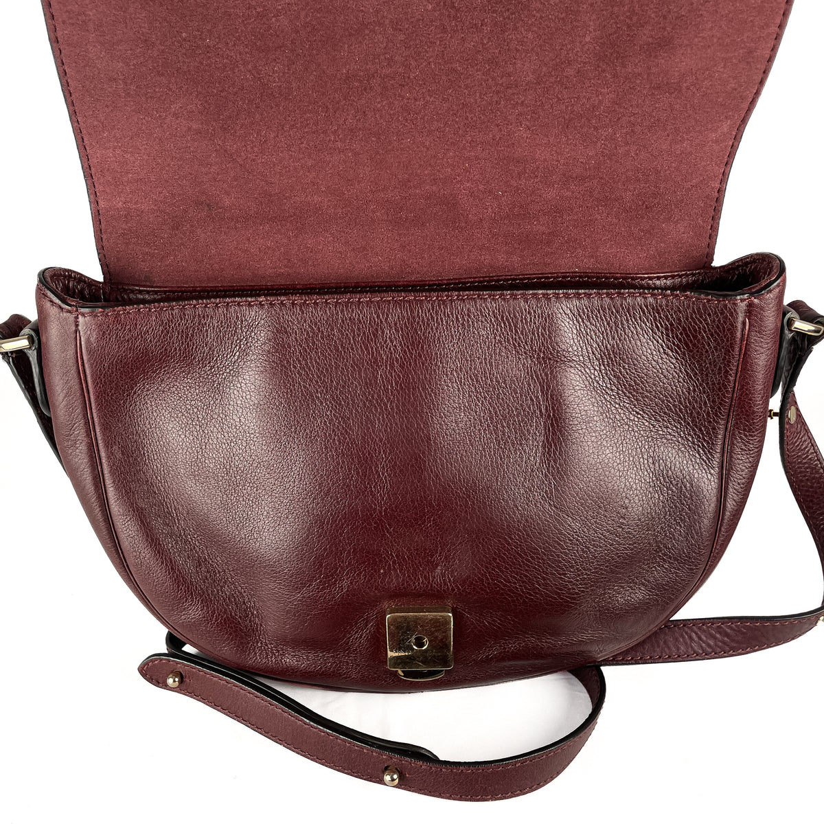 Inside flap of burgundy Mulberry Tessie leather satchel