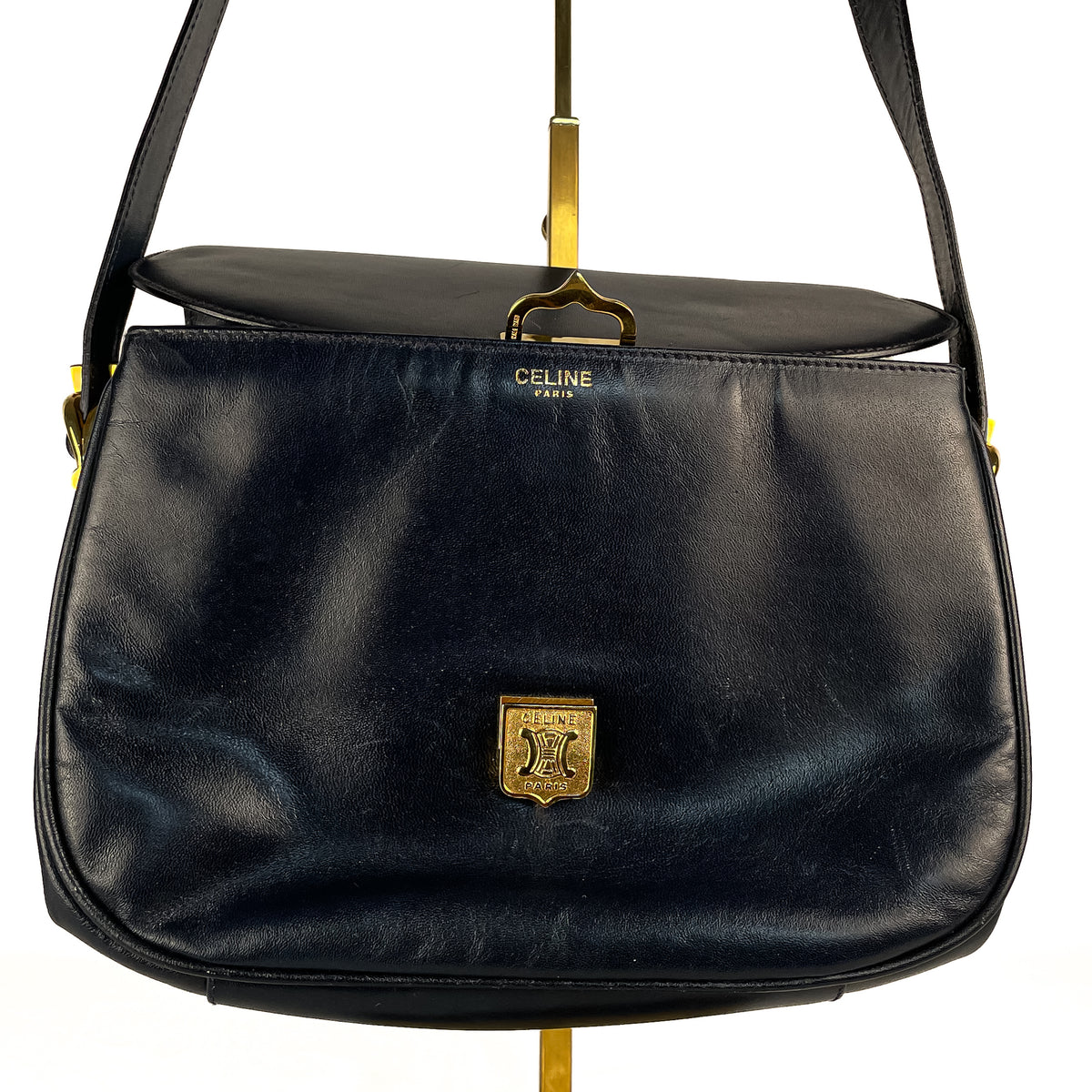Céline Horse & Carriage gold-tone clasp on navy leather crossbody bag