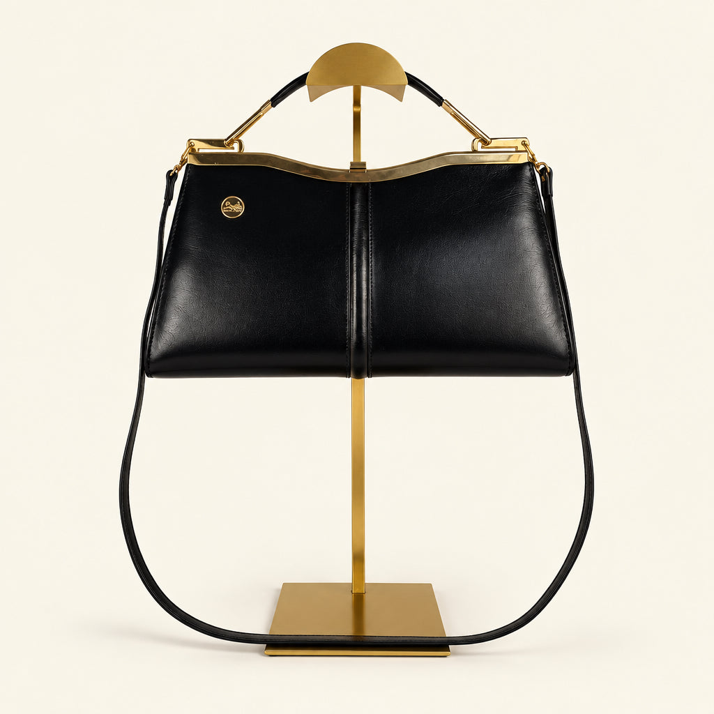 Vintage Céline Horse & Carriage navy leather handbag with gold-tone medallion