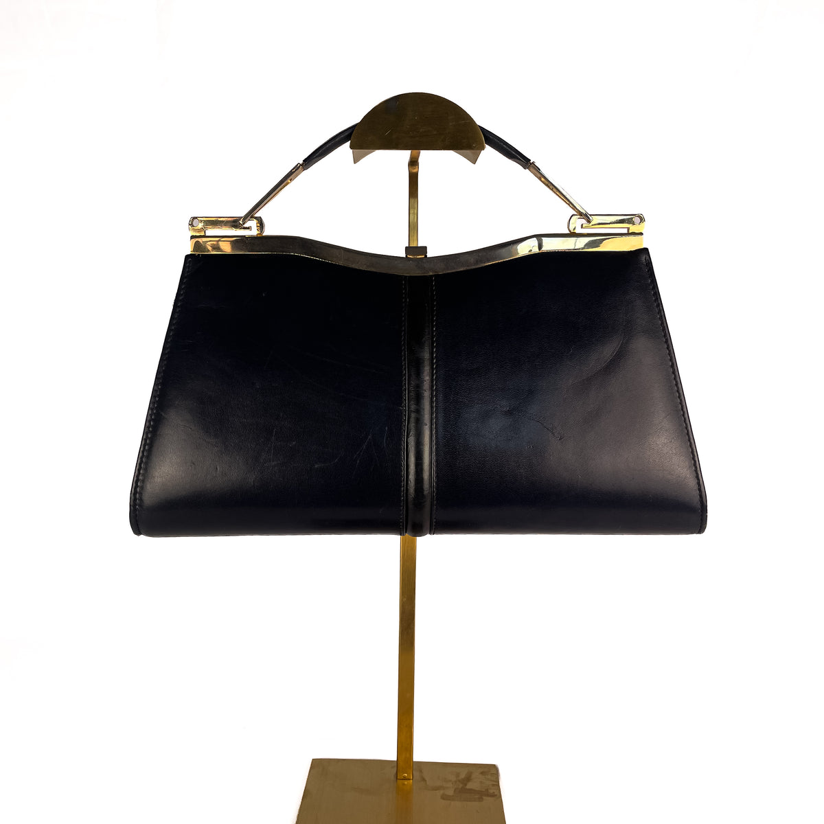 Back of vintage Céline navy leather handbag